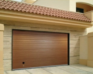 Почему секционные ворота выгодно сделать своими руками